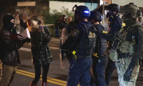 Portland braces for federal troops as protests escalate and conservative influencer is arrested