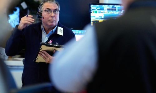 US stocks hang near their records as tech keeps climbing