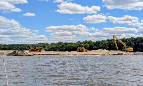 Manmade island rising in Mississippi River near Hastings