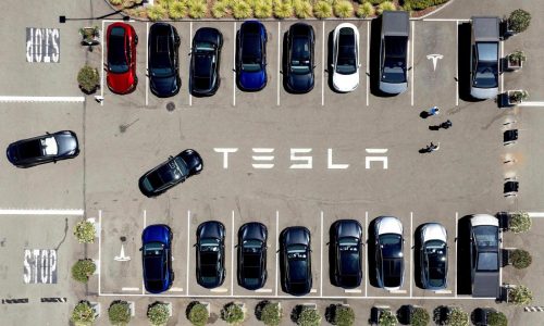 Parents of two college students killed in a Tesla allege design flaw trapped them in the burning car