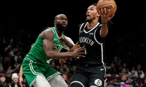 Celtics win ugly over lowly Nets to climb above .500 for first time