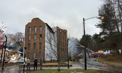 Fire crews continue battle at massive UMass apartment blaze