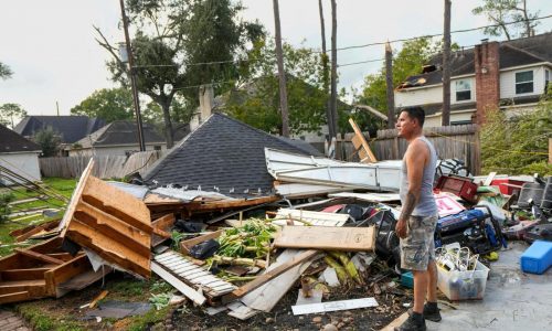 Torn roofs and smashed windows among damage to over 100 homes in a tornado near Houston