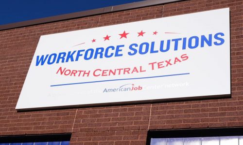 Fewer Americans sought unemployment benefits last week as layoffs remain low