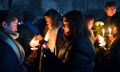 Brown University community holds vigil to mourn victims of shooting