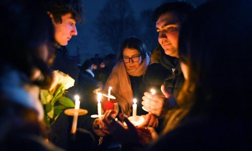 Authorities renew search for the Brown University shooter after releasing a person of interest