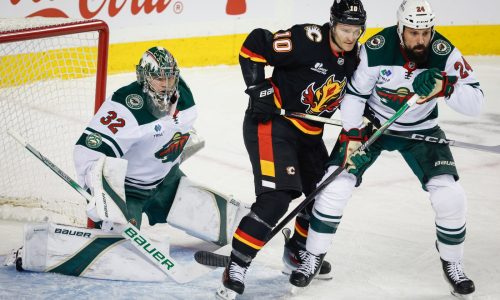 Flames dominate late to douse Wild point streak