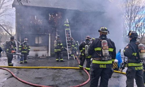 Danvers firefighters extinguish barn fire on Christmas, Whitman firefighters battle outside blaze that spread to wood deck