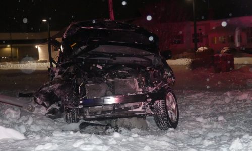 Vehicle stuck on tracks struck by Commuter Rail train