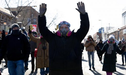 From frigid quiet to outraged sorrow, a few hours on Minneapolis street where agents killed man