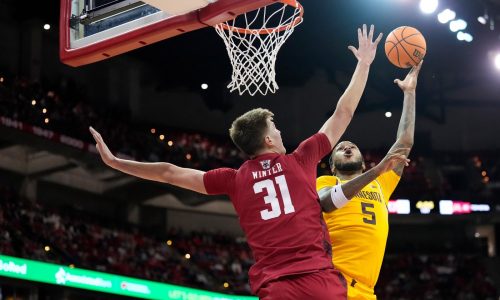Men’s basketball: Badgers rally past visiting Gophers