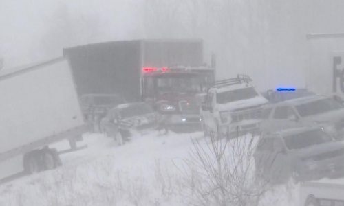 100 vehicles pile up in Michigan crash as snowstorm moves across the country