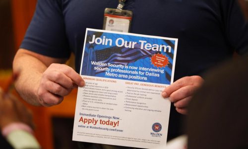 US applications for jobless aid fall to 206,000 last week as layoffs remain low