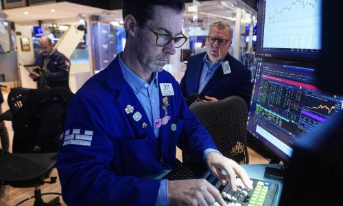 US stocks flirt with a record after the unemployment rate unexpectedly improves