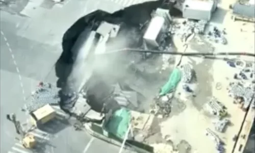 Massive Sinkhole Opens Up on Street in China