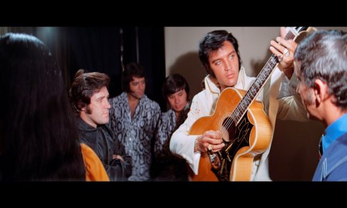 Review: Swagger, sweat and flirtation swirl in ‘EPiC: Elvis Presley in Concert,’ a tribute to a performer and little else