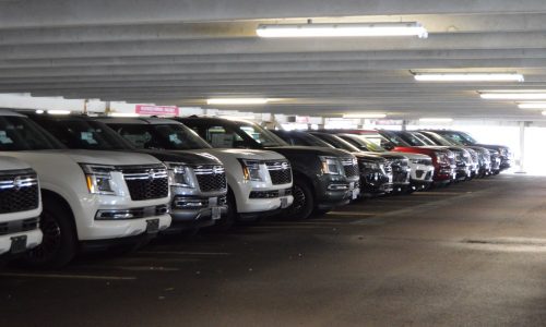 Dozens of new vehicles stored near Burlington ICE facility