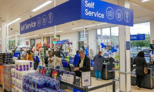 Tesco raises profit forecast and lifts share buyback to £950m